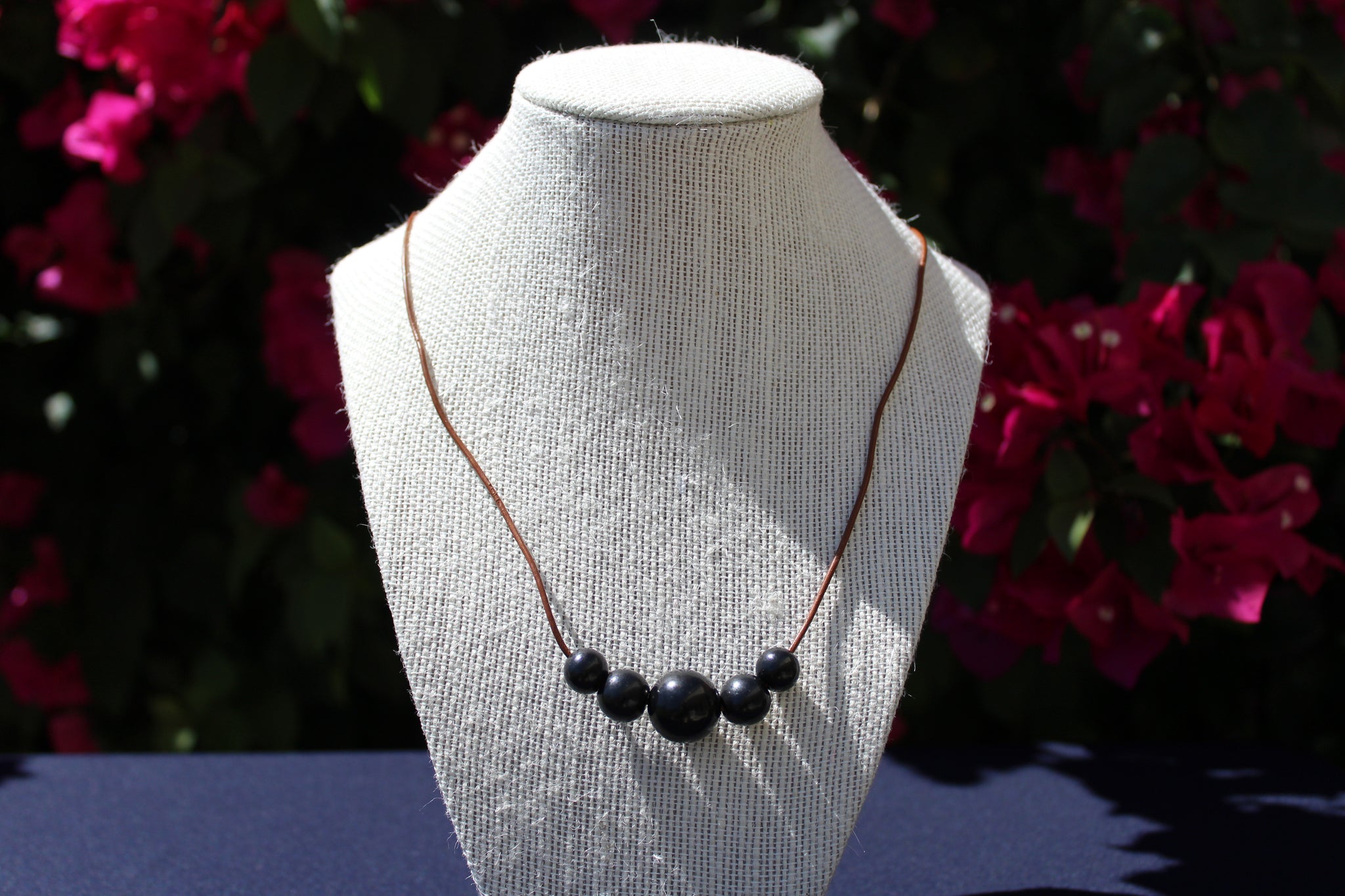 SHUNGITE POLISHED BEAD NECKLACE  ON LEATHER CORD